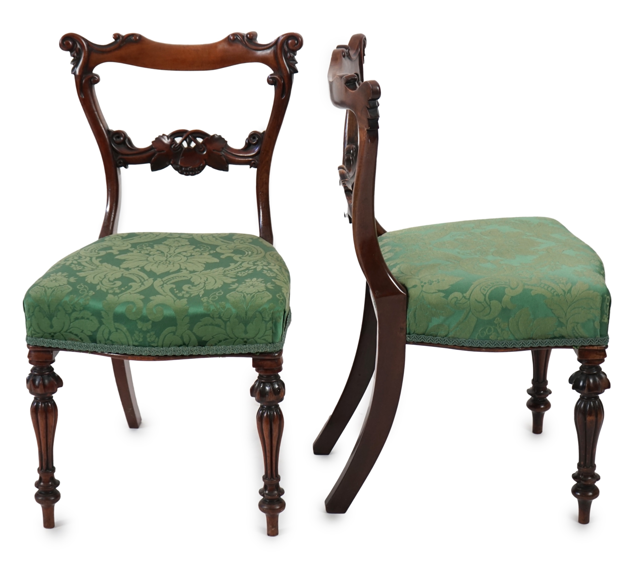 A pair early Victorian mahogany buckle back dining chairs